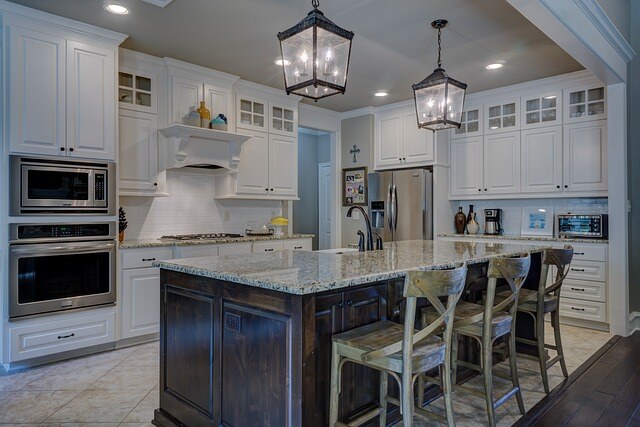 modern kitchen with island in middle